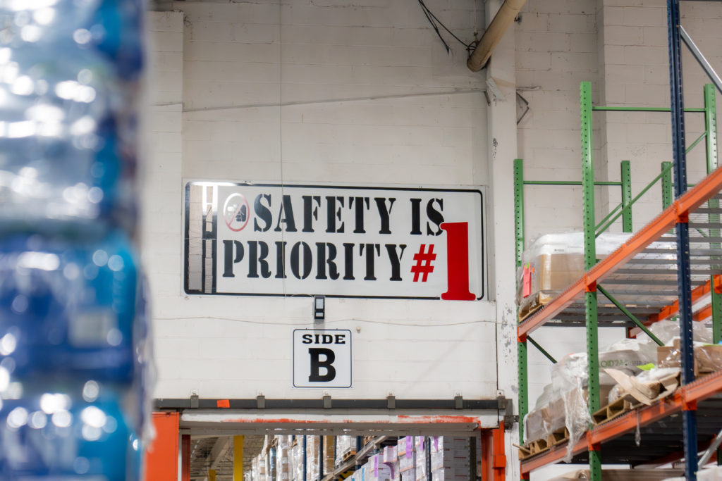 Sign in storage warehouse reading Safety is priority #1